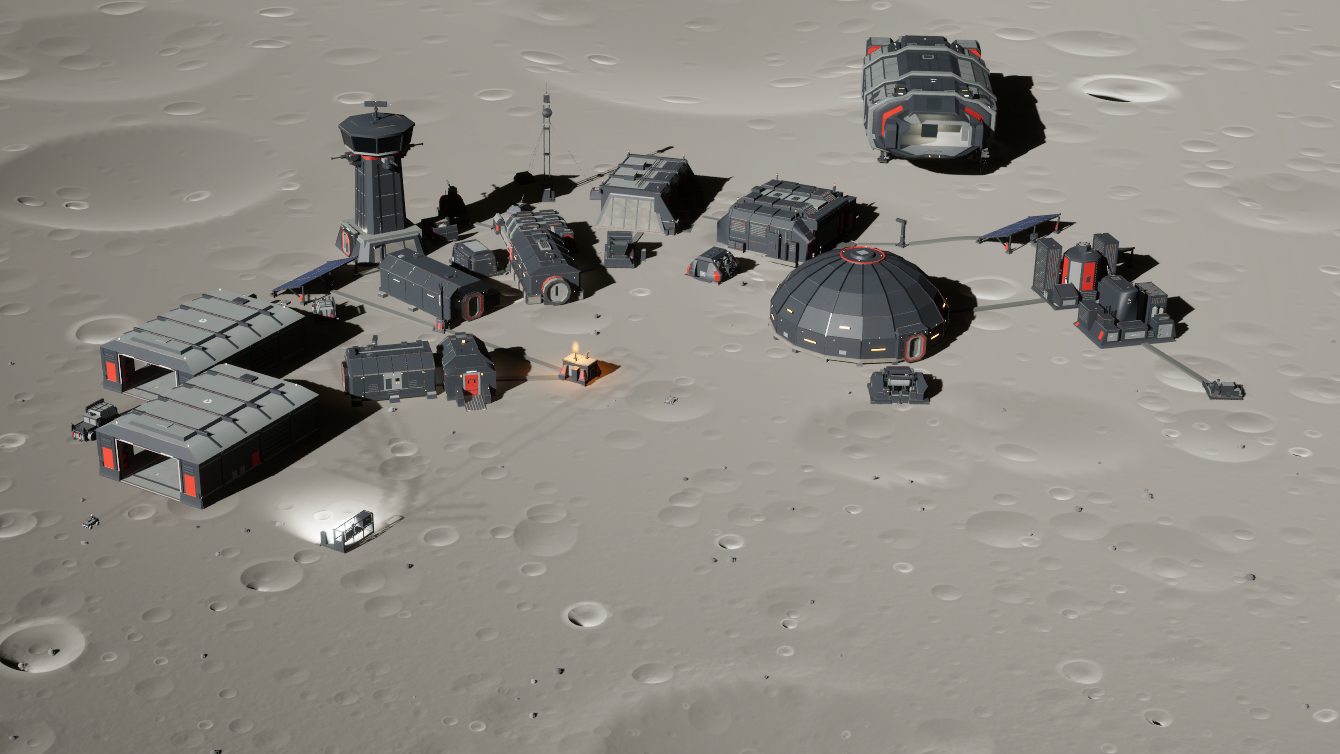 An Ironwatch base from the air: watchtower, hangars, modules and a domed farm, with the Rampart and Vigil landed nearby