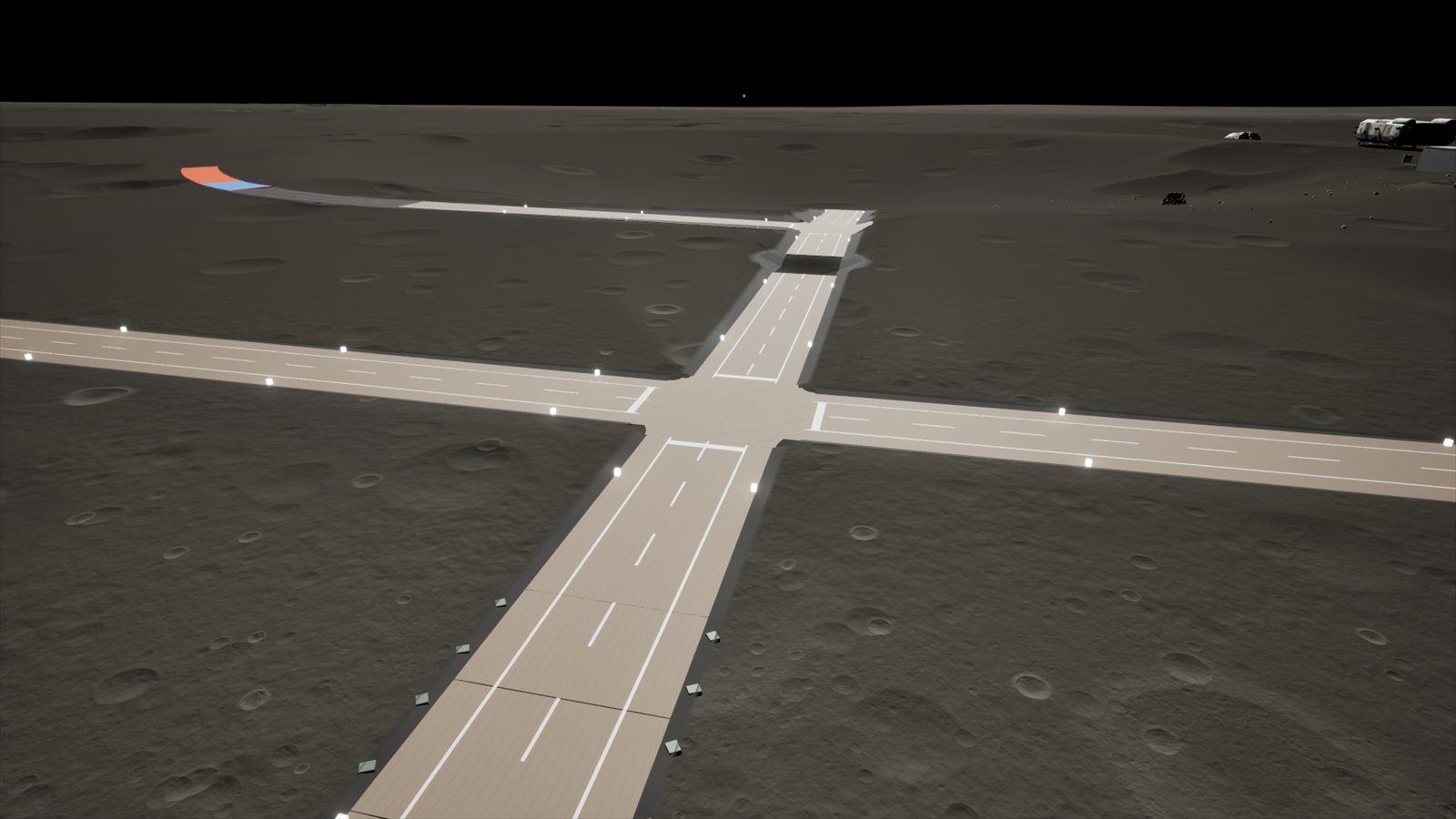 A paved four-way road junction on the Moon